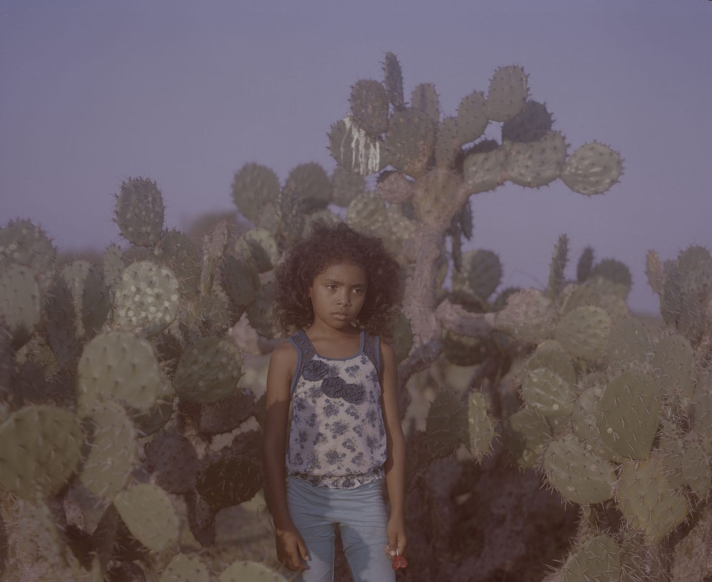 girl and cactus long-term photo project, focusing on the African Identity within Afro-communities in the Americas and Europe, on Costa Chica