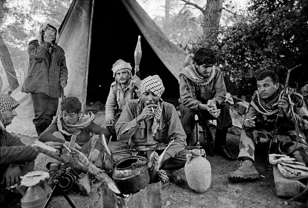 Palestinian Al Fatah (Movement of Liberation) relaxing in their camp after an operation, Bruno Barbey