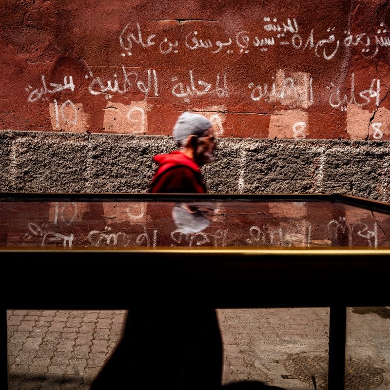 street photography, colorful images with high contrast and shadows in Morocco, Africa, by ivan Margot