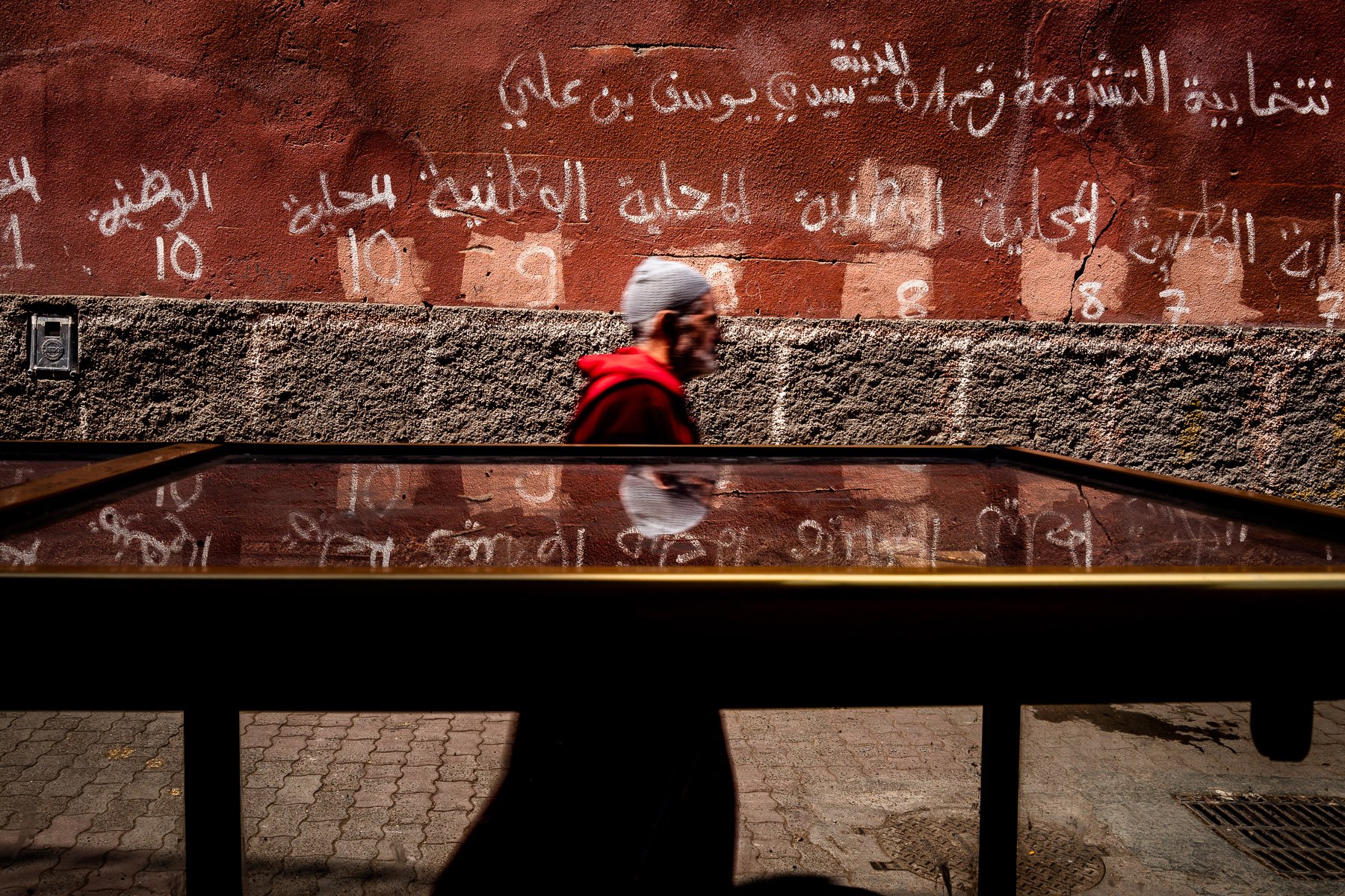 street photography, colorful images with high contrast and shadows in Morocco, Africa, by ivan Margot