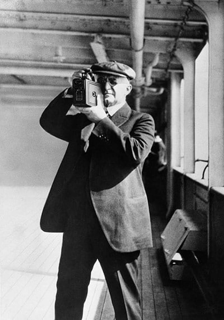 George Eastman taking pictures with a Kodak camera, 1925