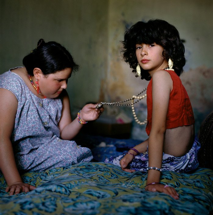 Two girls with necklace, Buenos Aires, Argentina, 1999 by photographer Alessandra Sanguinetti