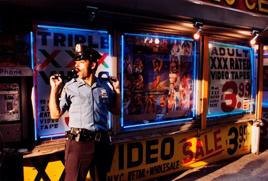 Policeman, color street photography in NYC (from Sidewalk) © Jeff Mermelstein