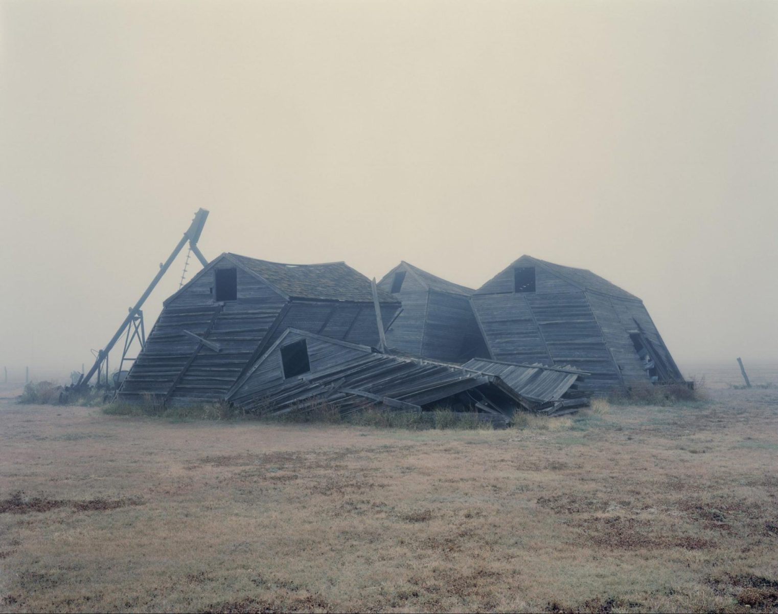 Crumpled Barns, Texas, 1995 photograph by Nadav Kander