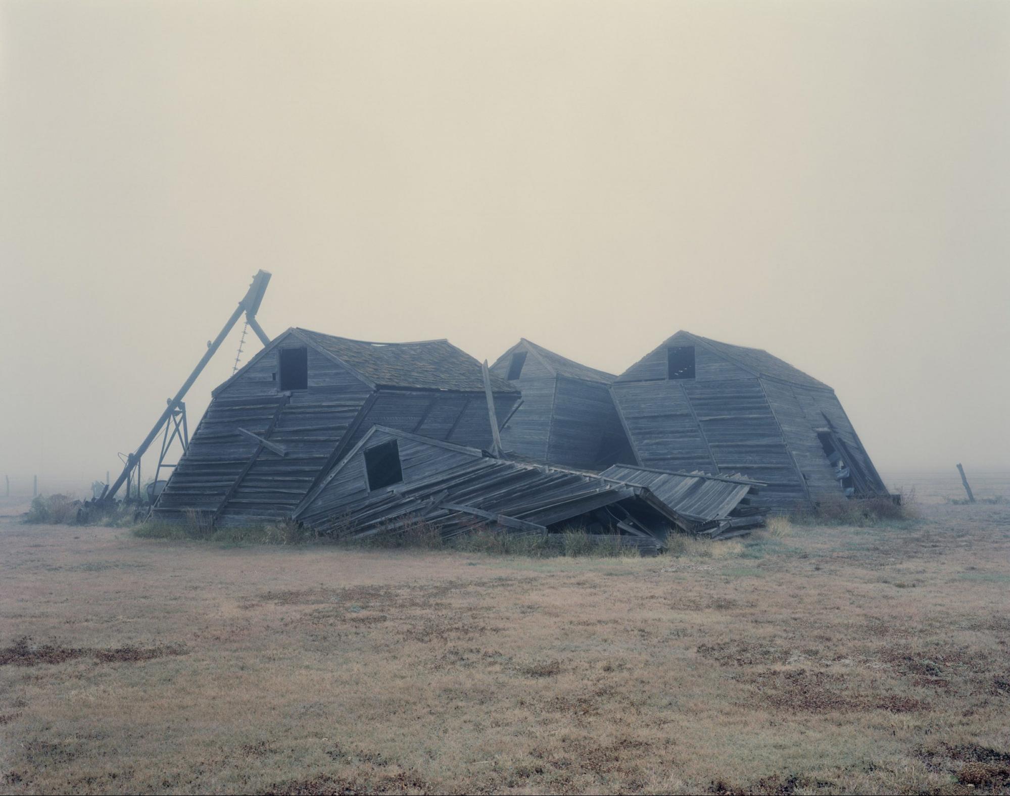 Crumpled Barns, Texas, 1995 photograph by Nadav Kander