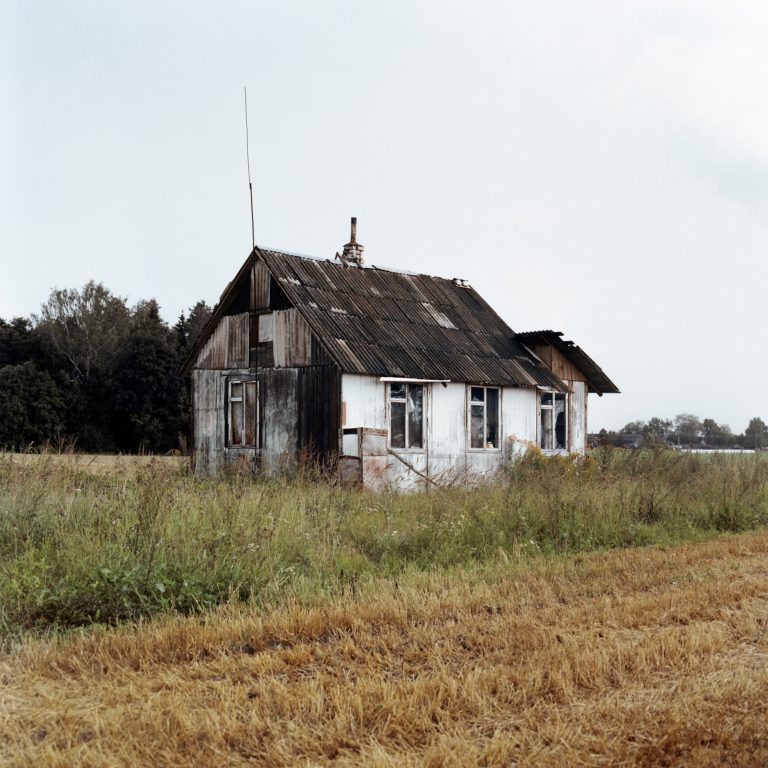 Color photo by Tadas Kazakevičius from Soon to be Gone, abandoned house, fields