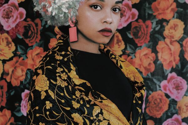 color self portrait of a woman with a colorful dress