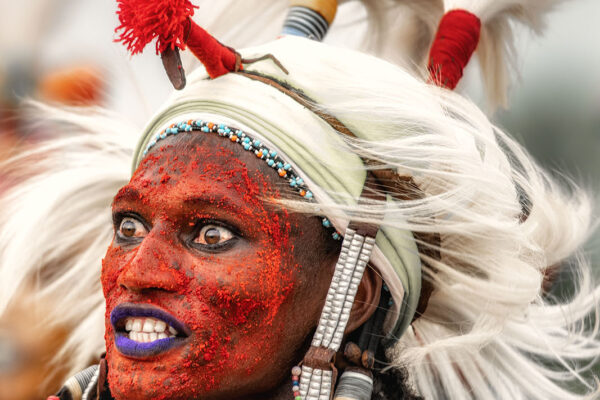 color portrait photograph of a man from Wodaabe tribe in Chad by Trevor Cole