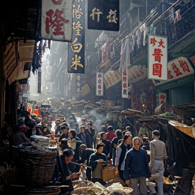 Color street photography by Fan Ho. Hong Kong market, 1950s 60s