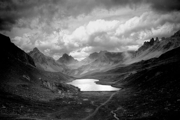 black and white landscape photo of mountain and lake, Mercantour NP, France/Italy by Aurelio Bormioli