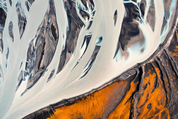 Aerial color landscape photo of frozen river in Iceland by Francesco Pierini