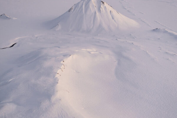color landscape photo of snow in Iceland by Max Agace
