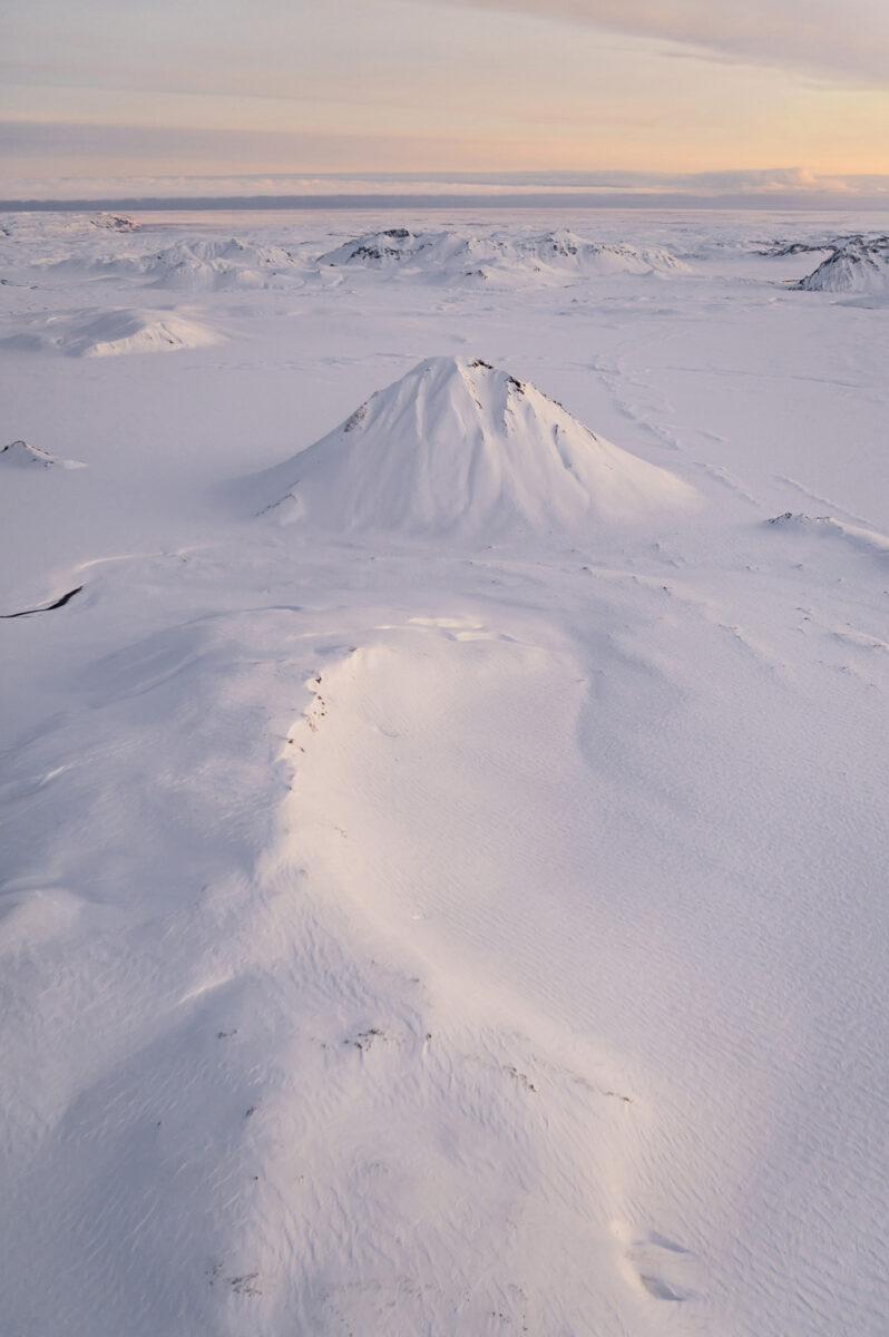 color landscape photo of snow in Iceland by Max Agace