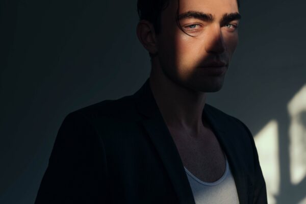 color fashion studio portrait of a male model by Carly Zavala