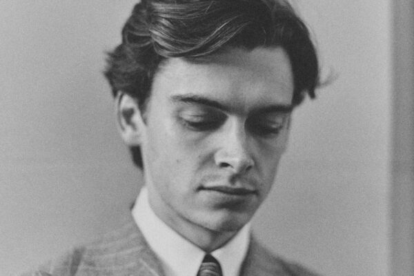 black & white fashion studio portrait of a male model by Elija Kulmer