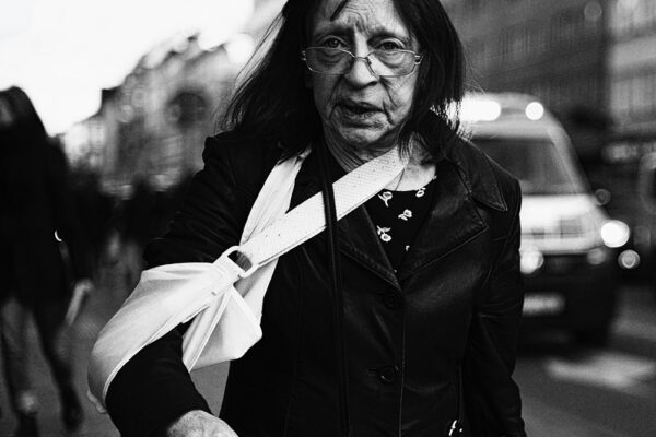 black and white street photo woman stockholm