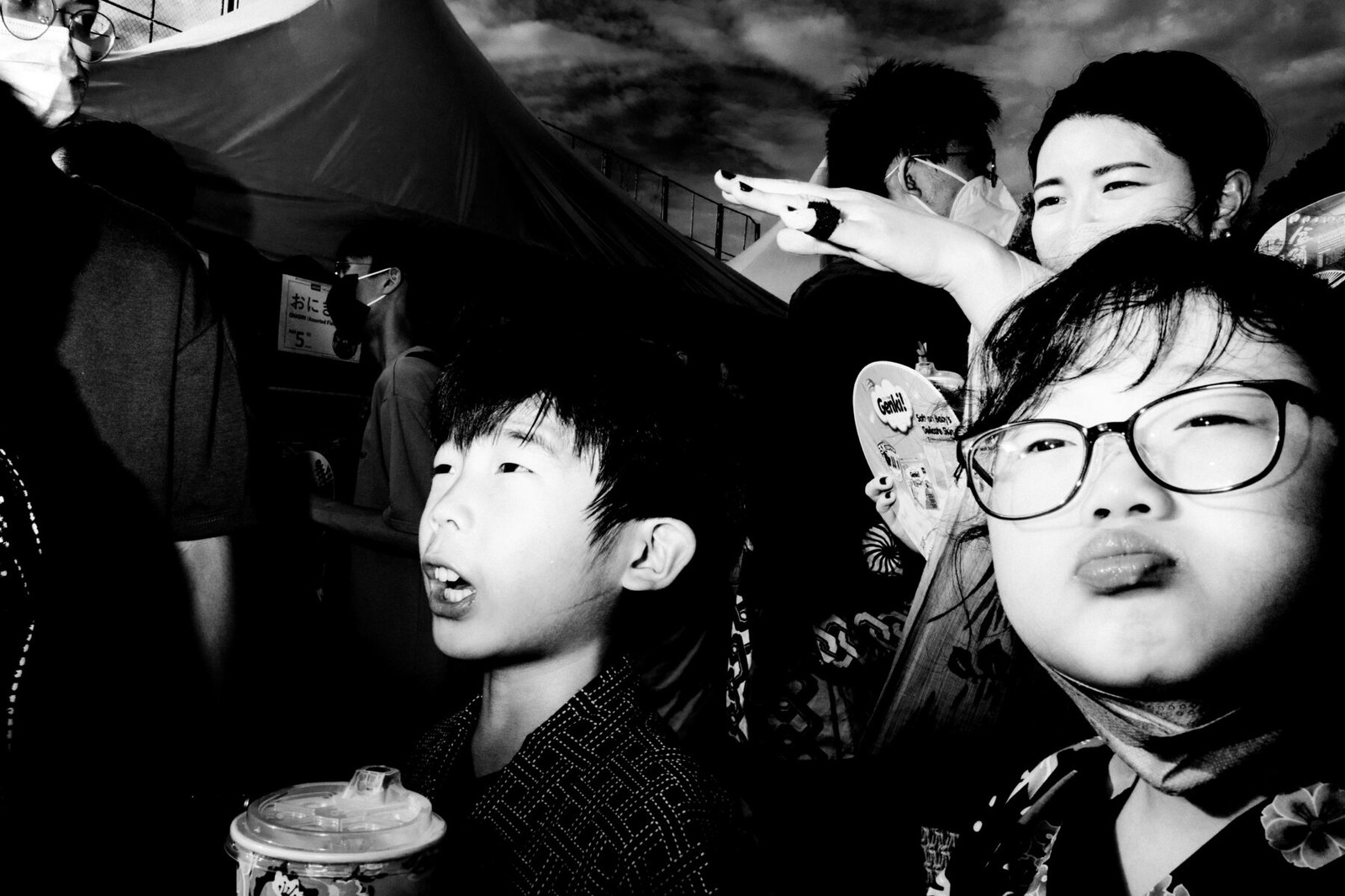 Black and White street photo of Bon Odori festival, Japan by Edmond Leong