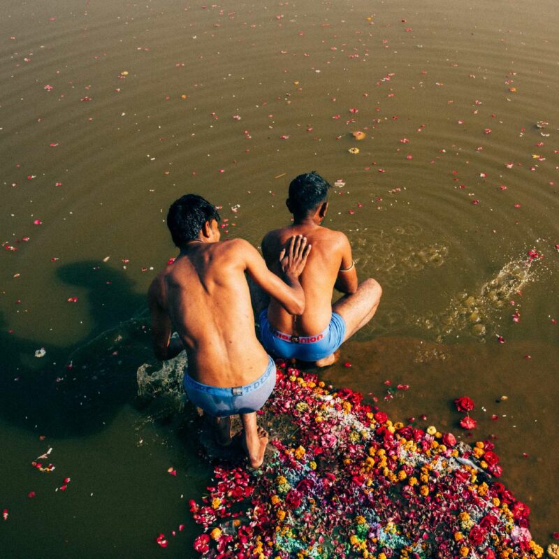 Photo of two men bathing in the ganges by Pie Aerts