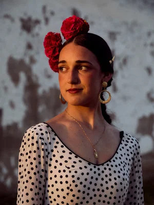 color portrait photo of woman at Romería de El Rocío I” - Andalusia, Spain, 2024 by Leon Foggitt