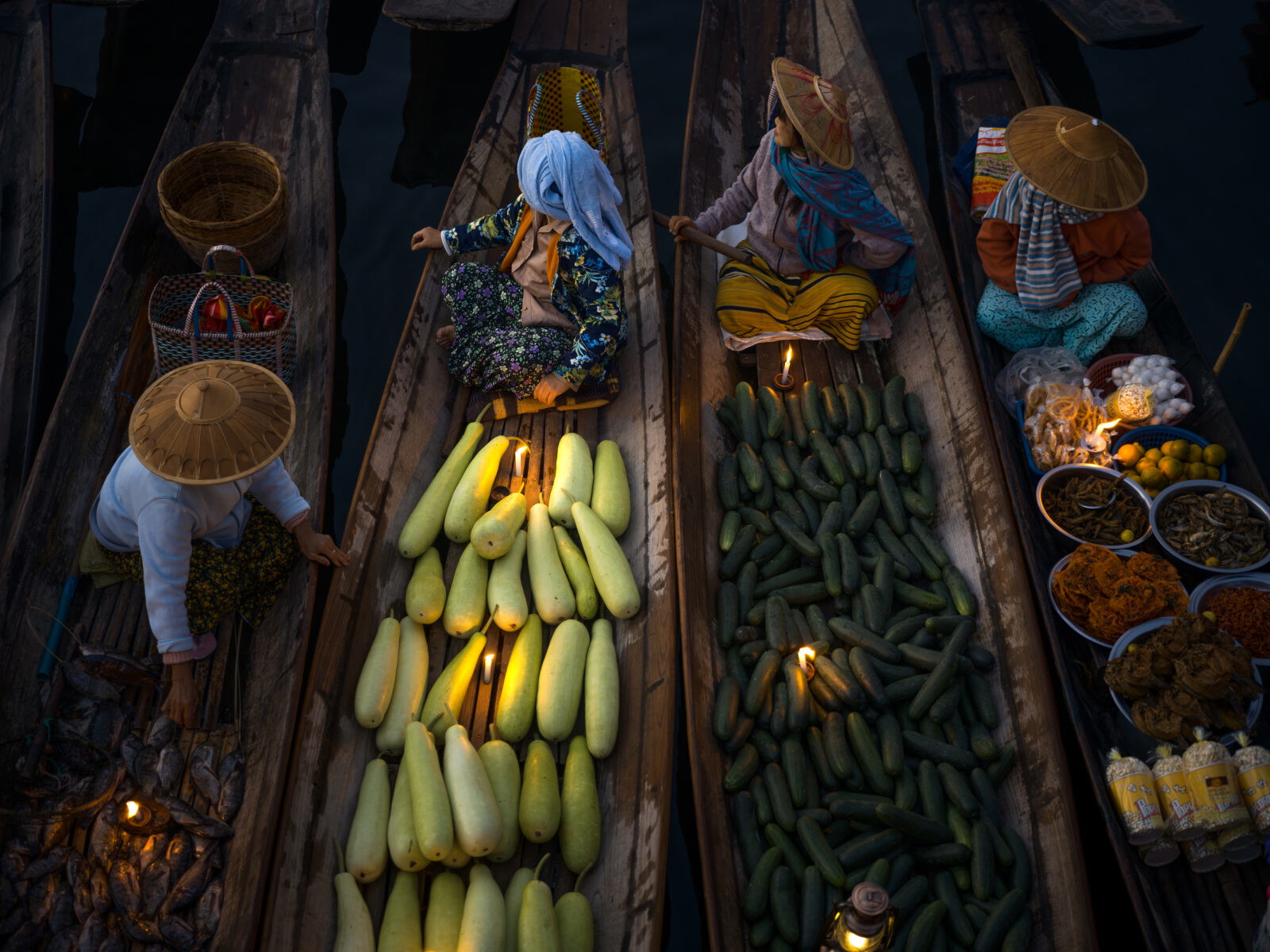 color travel photo of vendors in Inle Lake, Myanmar by Chan Kim