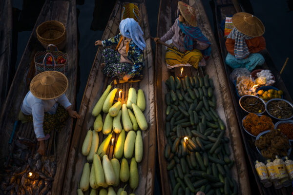 color travel photo of vendors in Inle Lake, Myanmar by Chan Kim