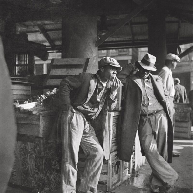 Black and white photography by Pierre Fatumbi Verger. Two black american men in the French Market, New Orleans, 1930s