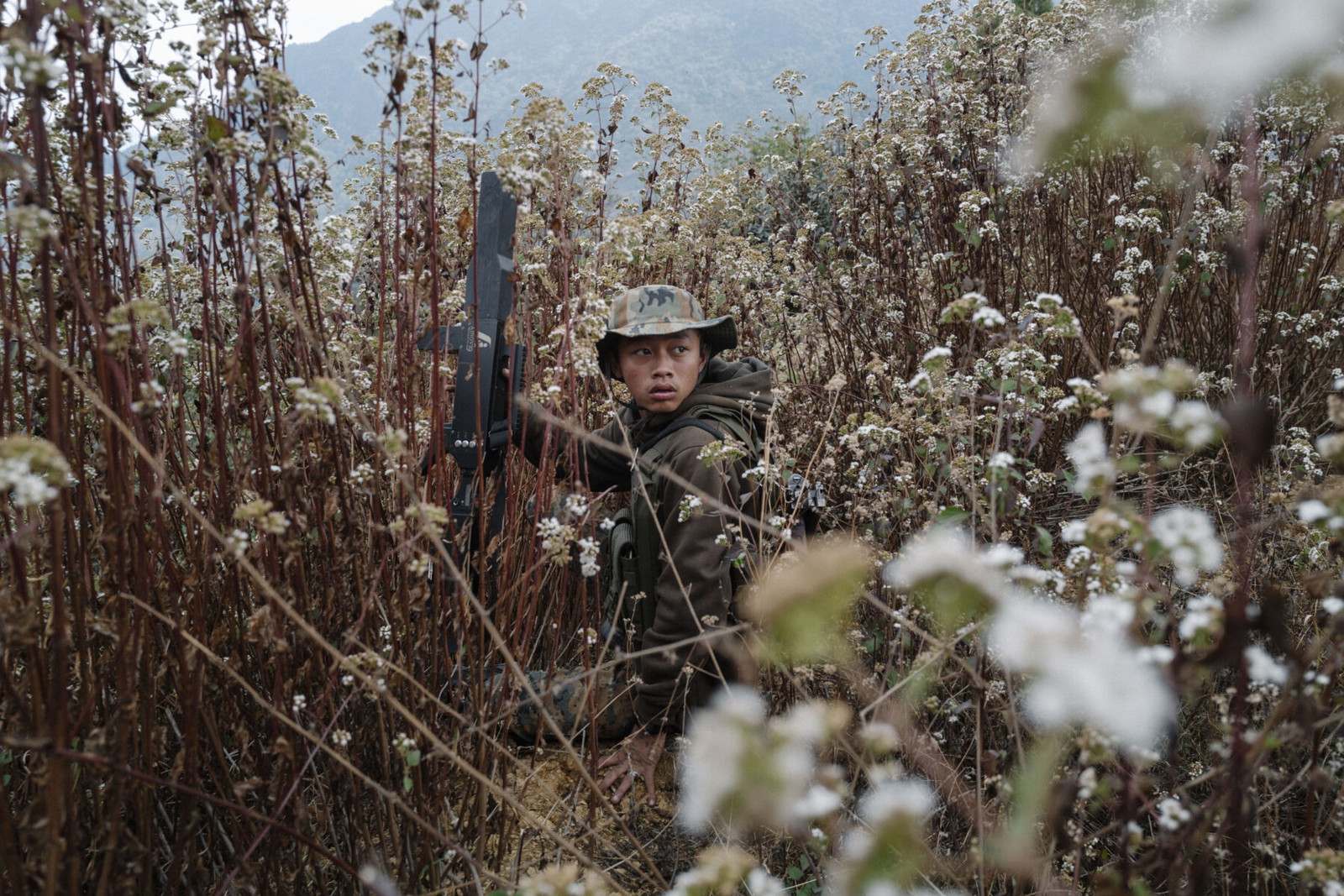 color portrait photo of young Chin resistant in Myanmar by Robin Tutenges