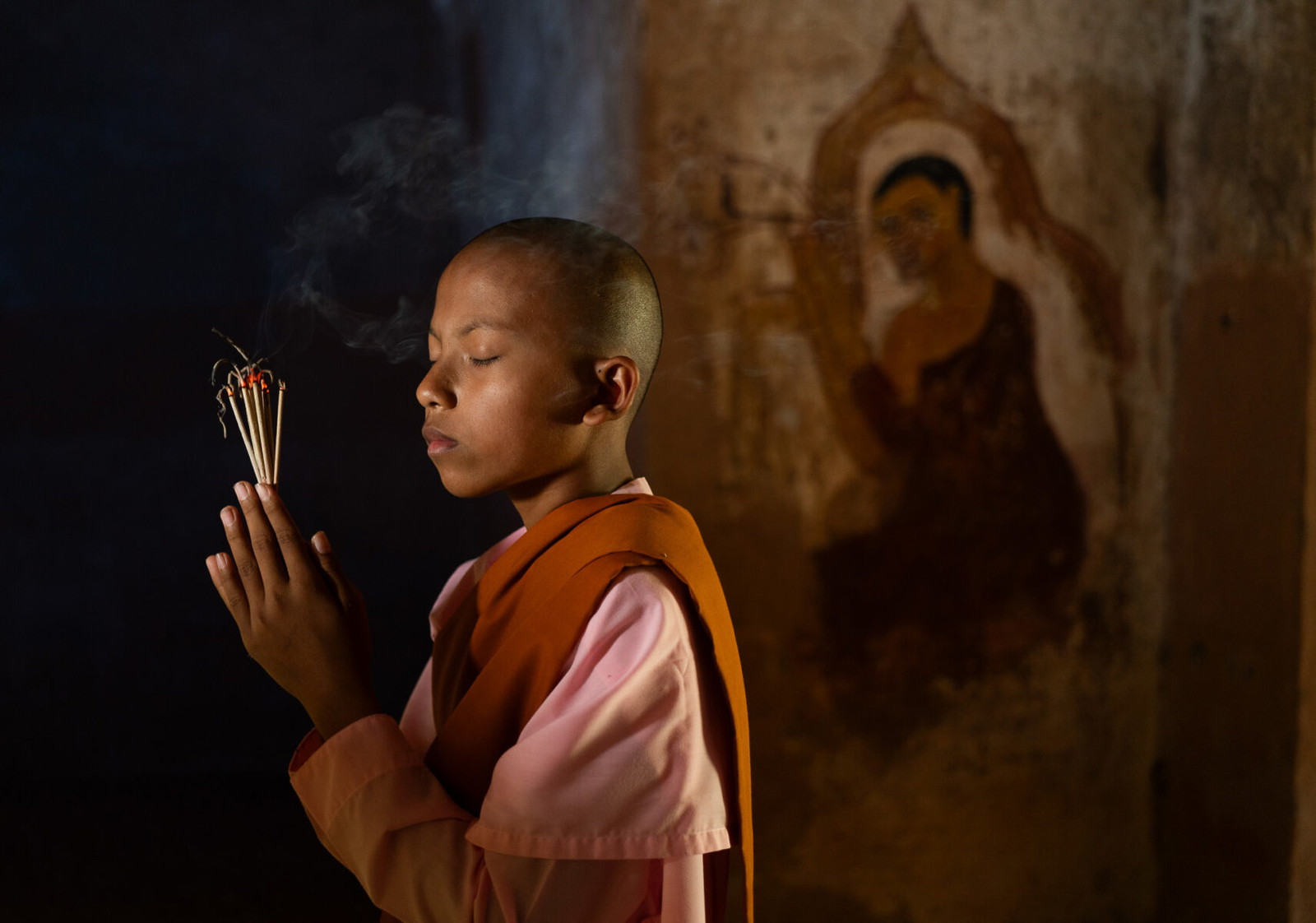 color visual story award photo of young buddhist in Bagan, Myanmar by Xavier Ayme