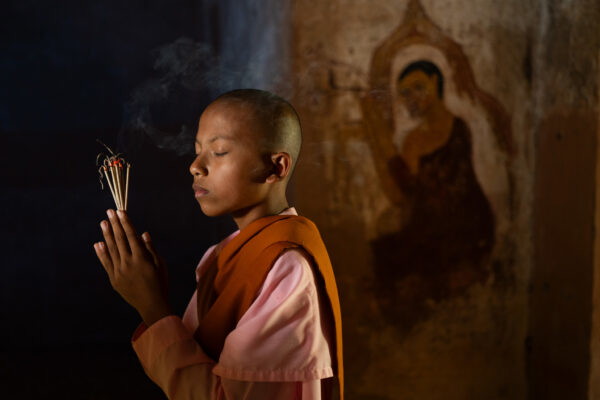color visual story award photo of young buddhist in Bagan, Myanmar by Xavier Ayme