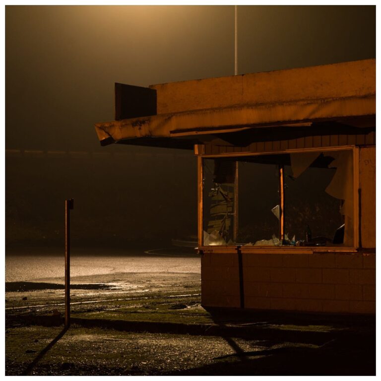 Color landscape photography by Bill Holderfield. Derelict store at night