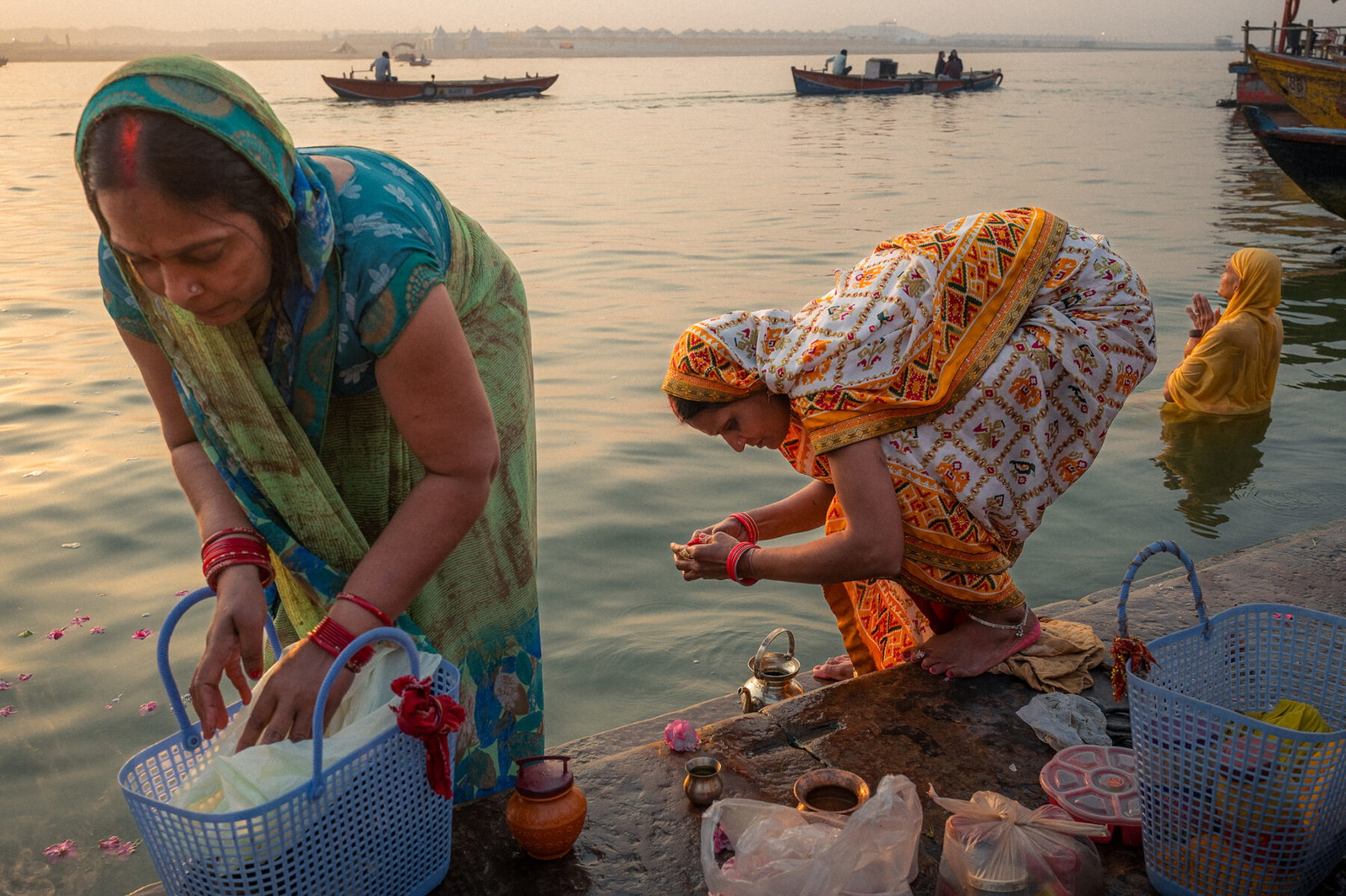 color street photography of women washing in Ganges in Varanasi, India by Will Fortune