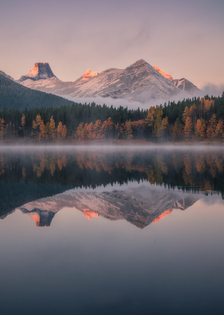 color landscape photo of mountain and lake in Alberta, Canada by Collin Toews