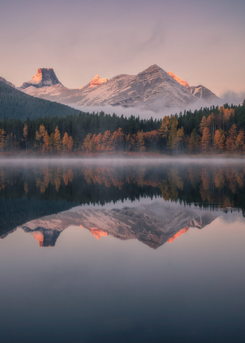 color landscape photo of mountain and lake in Alberta, Canada by Collin Toews
