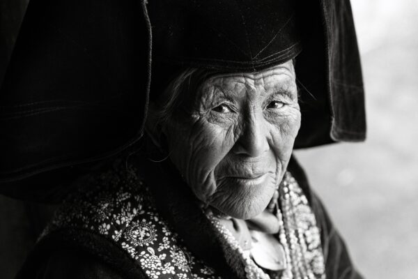 black and white fine art portrait of chinese elderly woman by Baolong Song