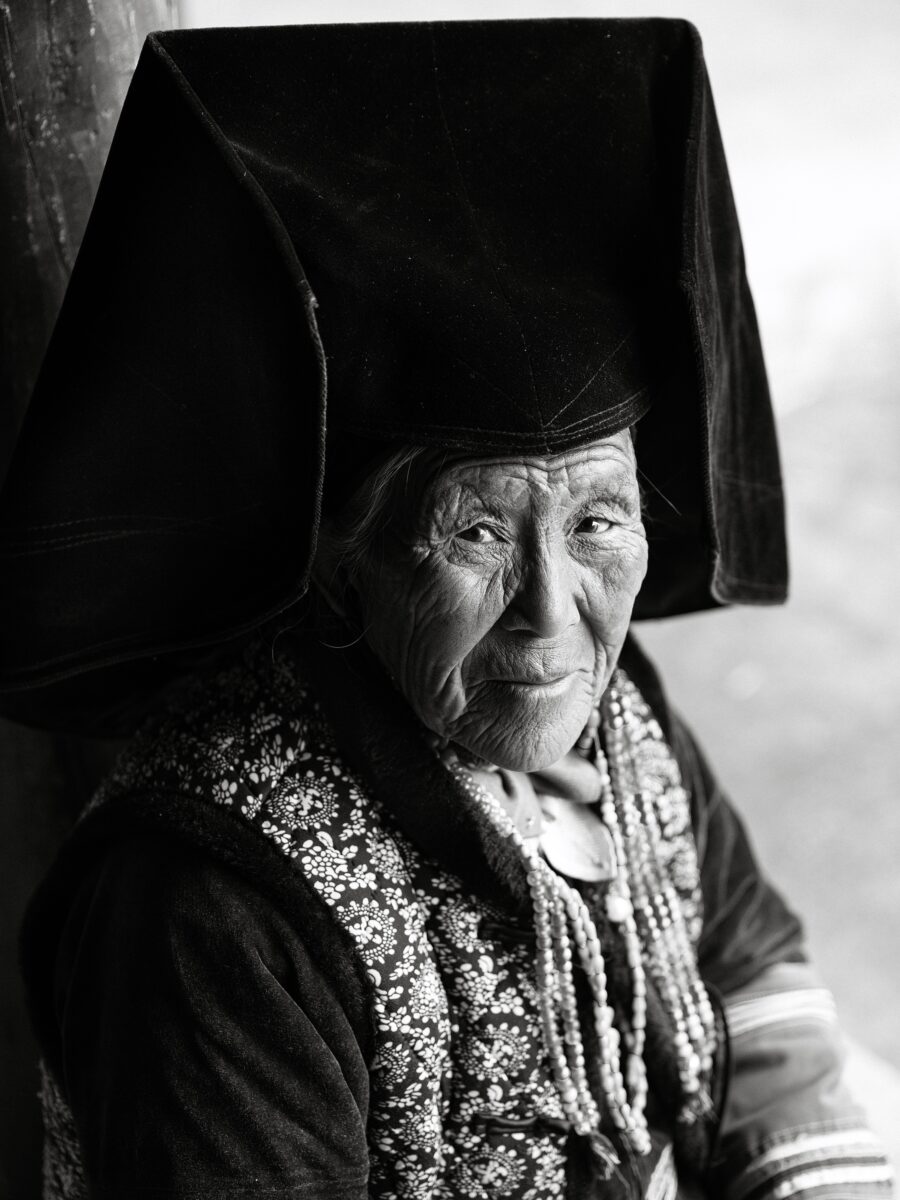 black and white fine art portrait of chinese elderly woman by Baolong Song