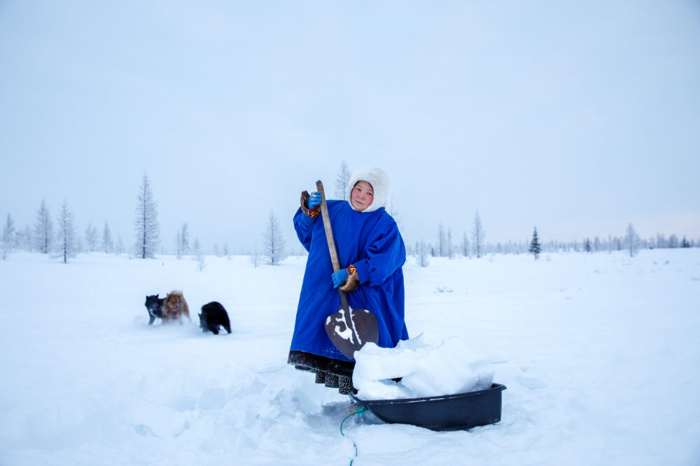 Color portrait photo of woman In Russian arctic circle by Mark Muscat de Celis