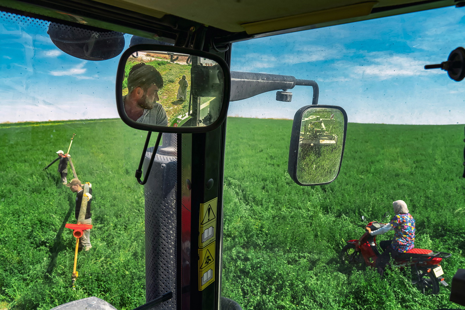 Photo of people in a green field in Turkey by F. Dilek Yurdakul