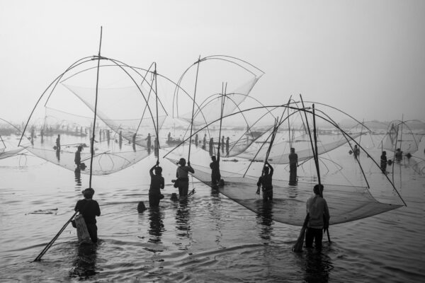 Black and white photo of fishermen in Bangladesh by Bipul Ahmed