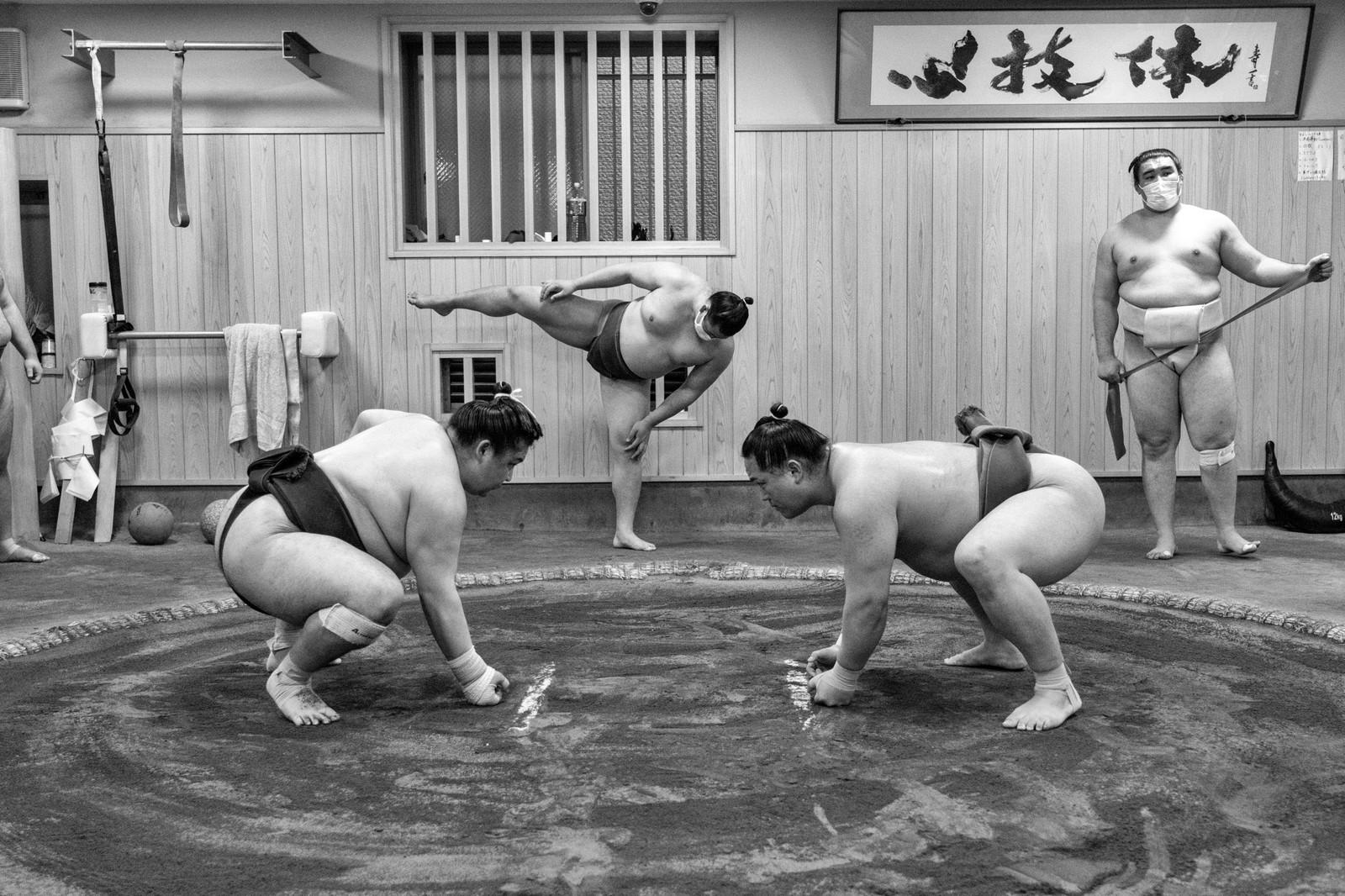 black and white photo of sumo wrestlers in cTokyo, Japan by Danielle L Goldstein