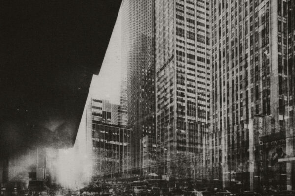 Black and white double exposure photo of New York city street traffic by Igor Panitz