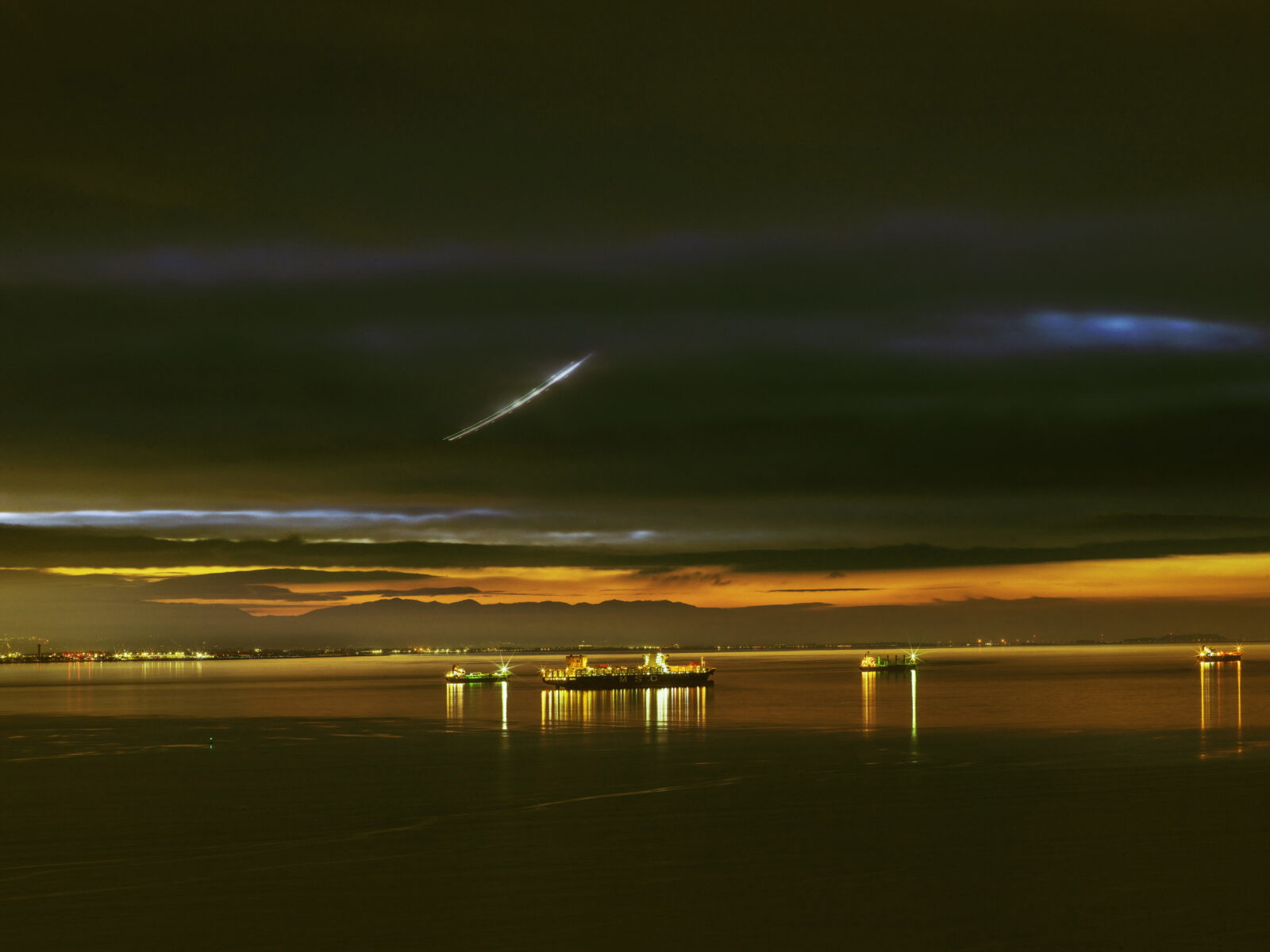 Landscape photography by Richard Misrach. Ships at early sunrise, San Francisco Bay. From the book 'Cargo'