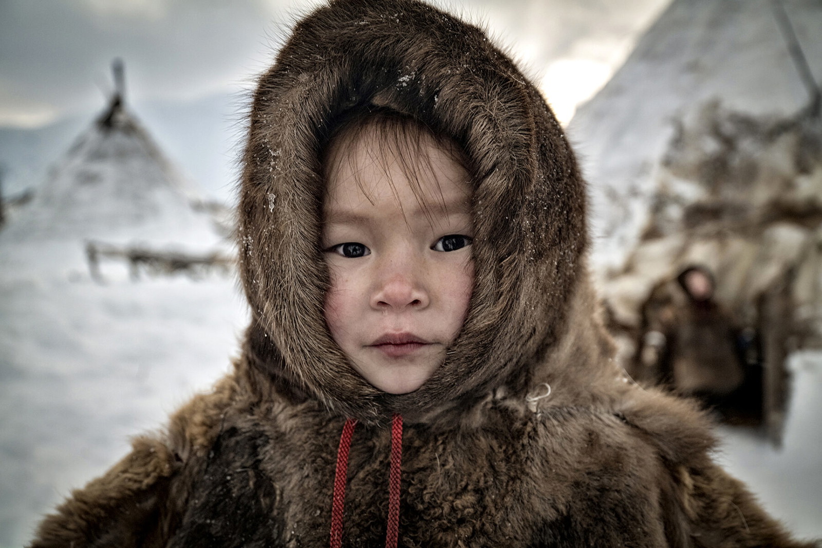 color Portrait of a young Nenet in Yamal Peninsula, Siberia, by Eugenio Fieni