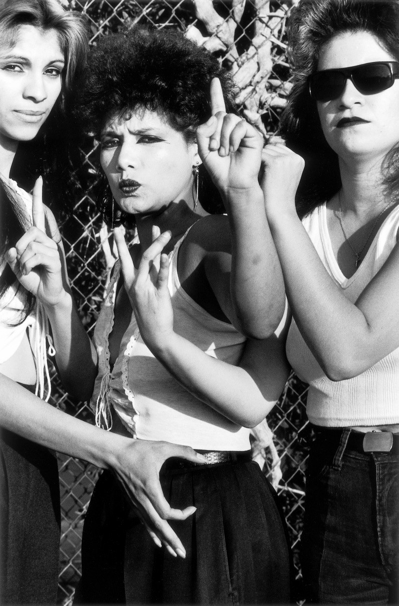 Black & white photography by Graciela Iturbide. Portrait of female chicano gang members, Los Angeles