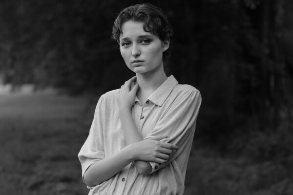 black and white portrait photo of young woman by Ian McFarlane
