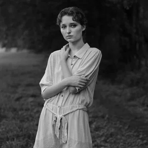 black and white portrait photo of young woman by Ian McFarlane