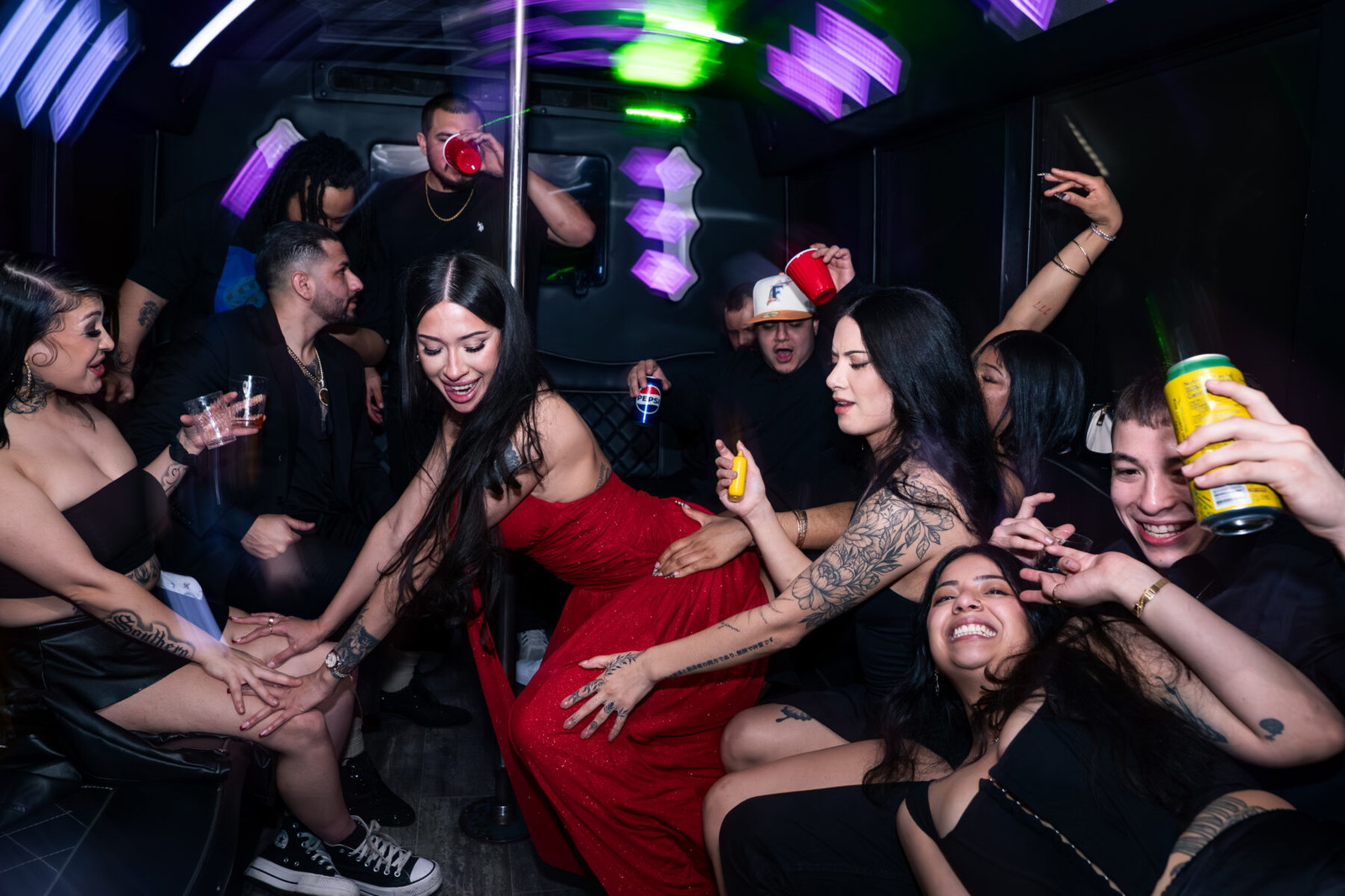 color photo of people dancing in bus in Eugene, Oregon, USA by Marcus Holloway