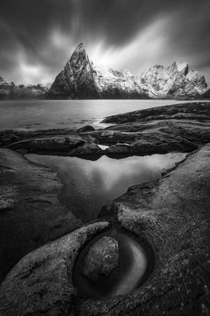Black and white landscape photo of Island fjord by Juan Lopez Ruiz