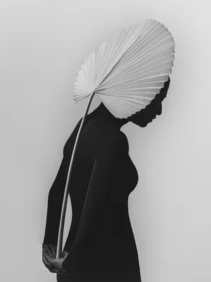 Black and white fine art portrait of woman by Ray Vázquez