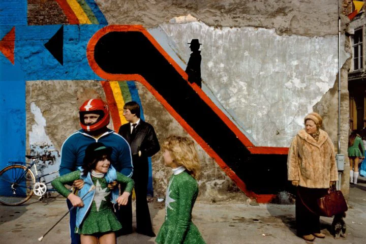 Color photography by Harry Gruyaert. Street scene during a carnival in Antwerp