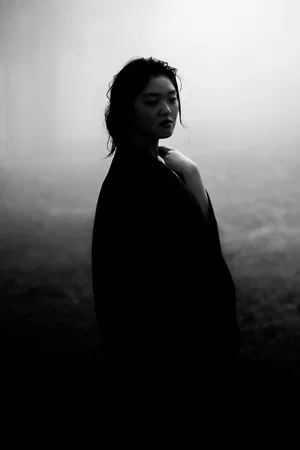 black and white portrait photo of a woman by Lehman Pekkola